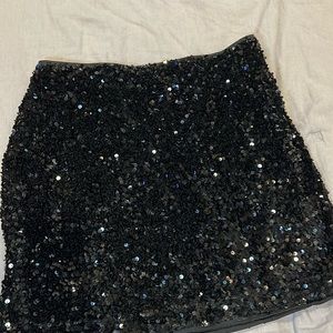 Black sequence mini skirt